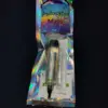 A tiny, colorful, vertical object on black.| Psilocybin Myco