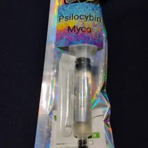 A blurry image of a product in a clear plastic bag.| Psilocybin Myco (Cambodian)