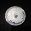 A round white object with text on it.| Psilocybin Myco